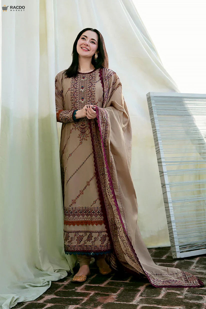 Woman in a traditional outfit standing next to a white curtain

