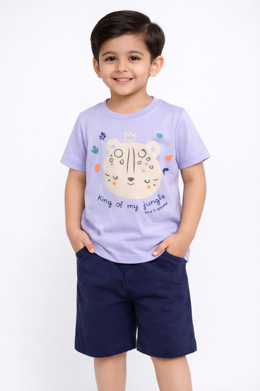 Child wearing a light purple t-shirt with a tiger design and text, standing against a white background.

