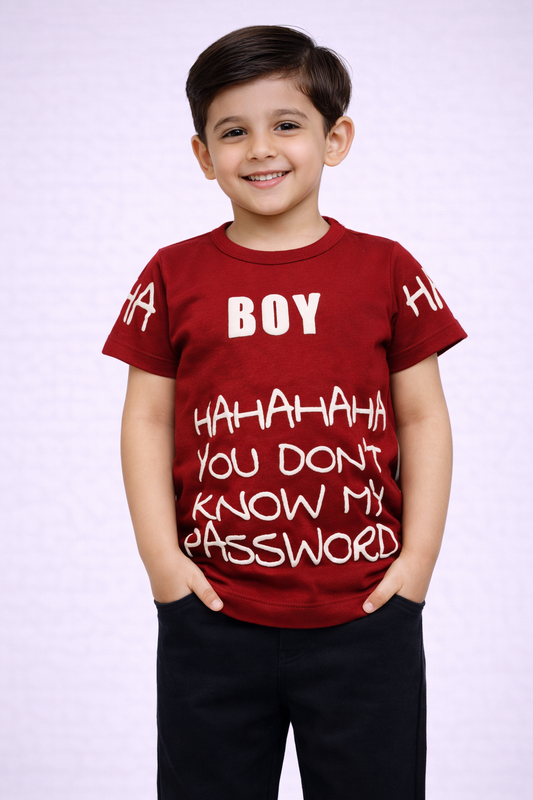 Child wearing a red t-shirt with humorous text on a plain background

