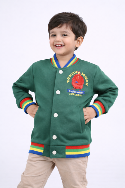 Child wearing a green varsity jacket with colorful accents on a white background

