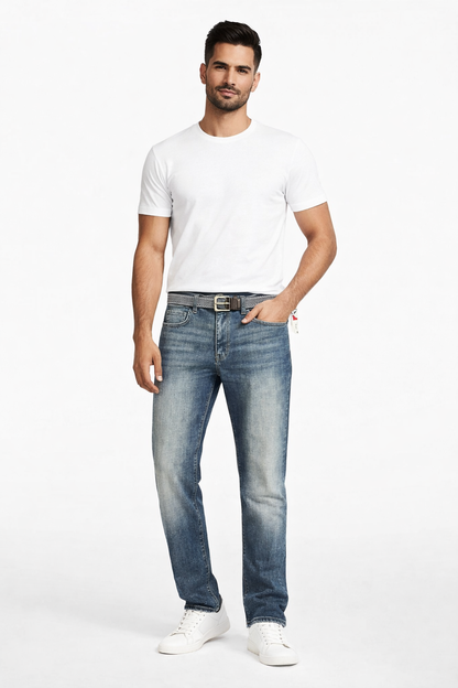 Man wearing a white t-shirt and blue jeans on a white background

