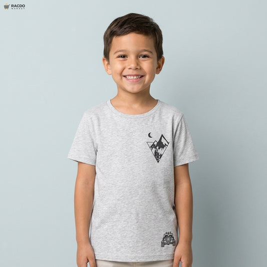 Child wearing a gray t-shirt with a graphic design on a light gray background