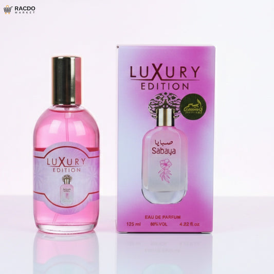 Pink perfume bottle and packaging with 'Luxury Edition' branding on a white background.