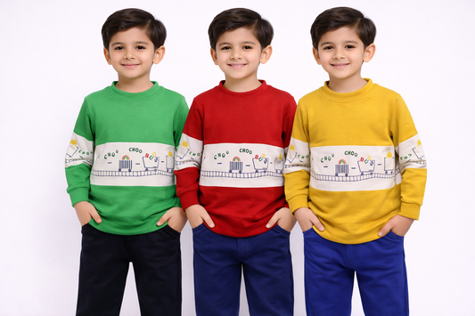 Three children wearing colorful sweaters with a patterned design on a white background

